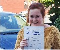  Simone with Driving test pass certificate